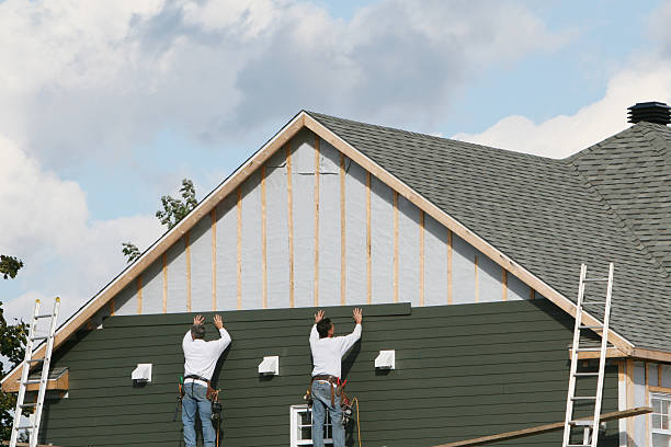 Professional Siding Replacement technician working in Manns Choice, PA